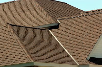 large home roof, brown shingles
